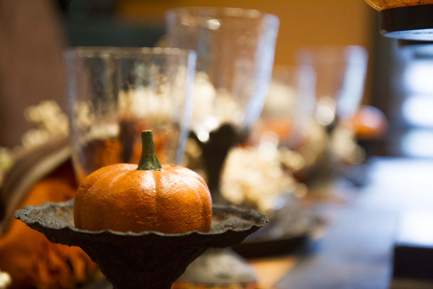 thanksgiving table setting with pumpkin